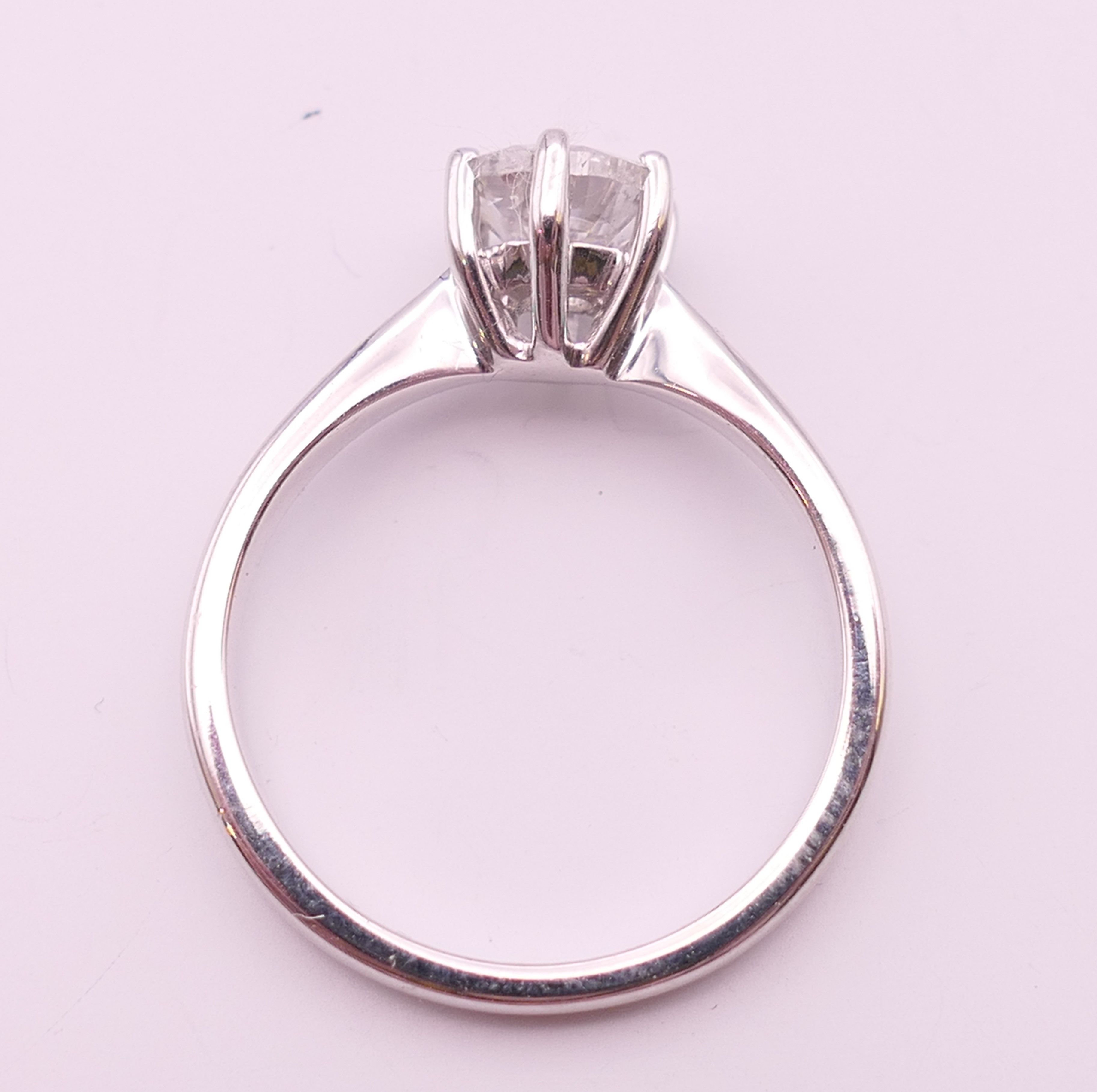 An 18 ct white gold diamond solitaire ring, the stone approximately 0.8 carat. Ring size M. - Image 3 of 6