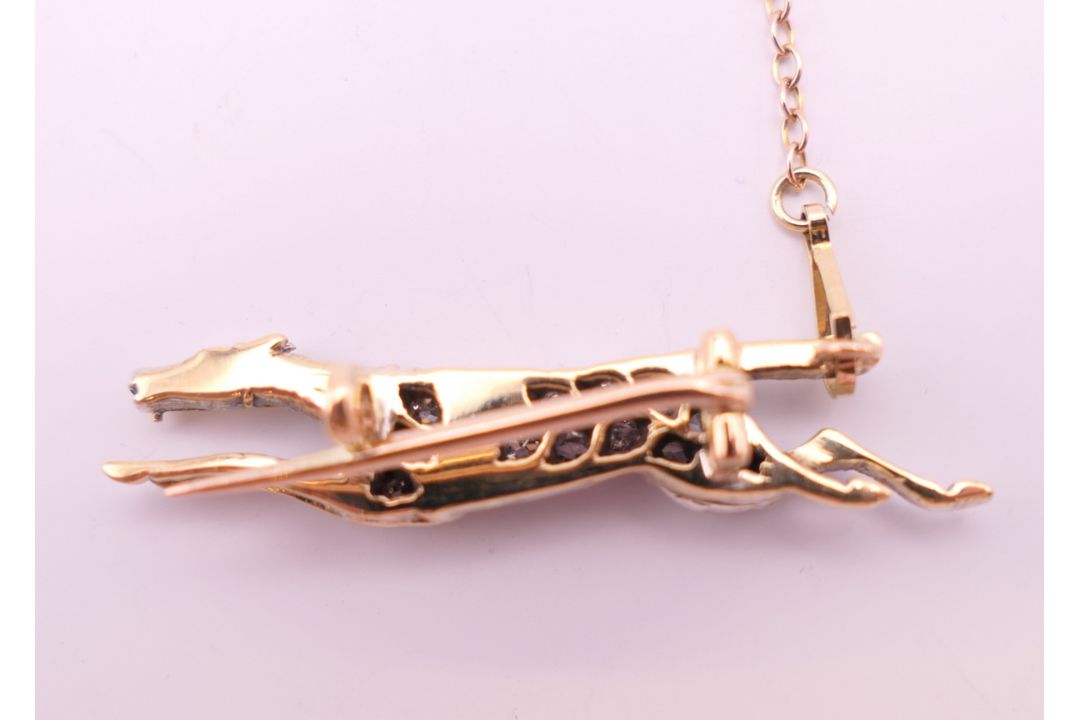 A diamond set unmarked gold racehorse brooch, possibly the horse ''Warmspun''. 3.5 cm long. 4. - Image 2 of 7