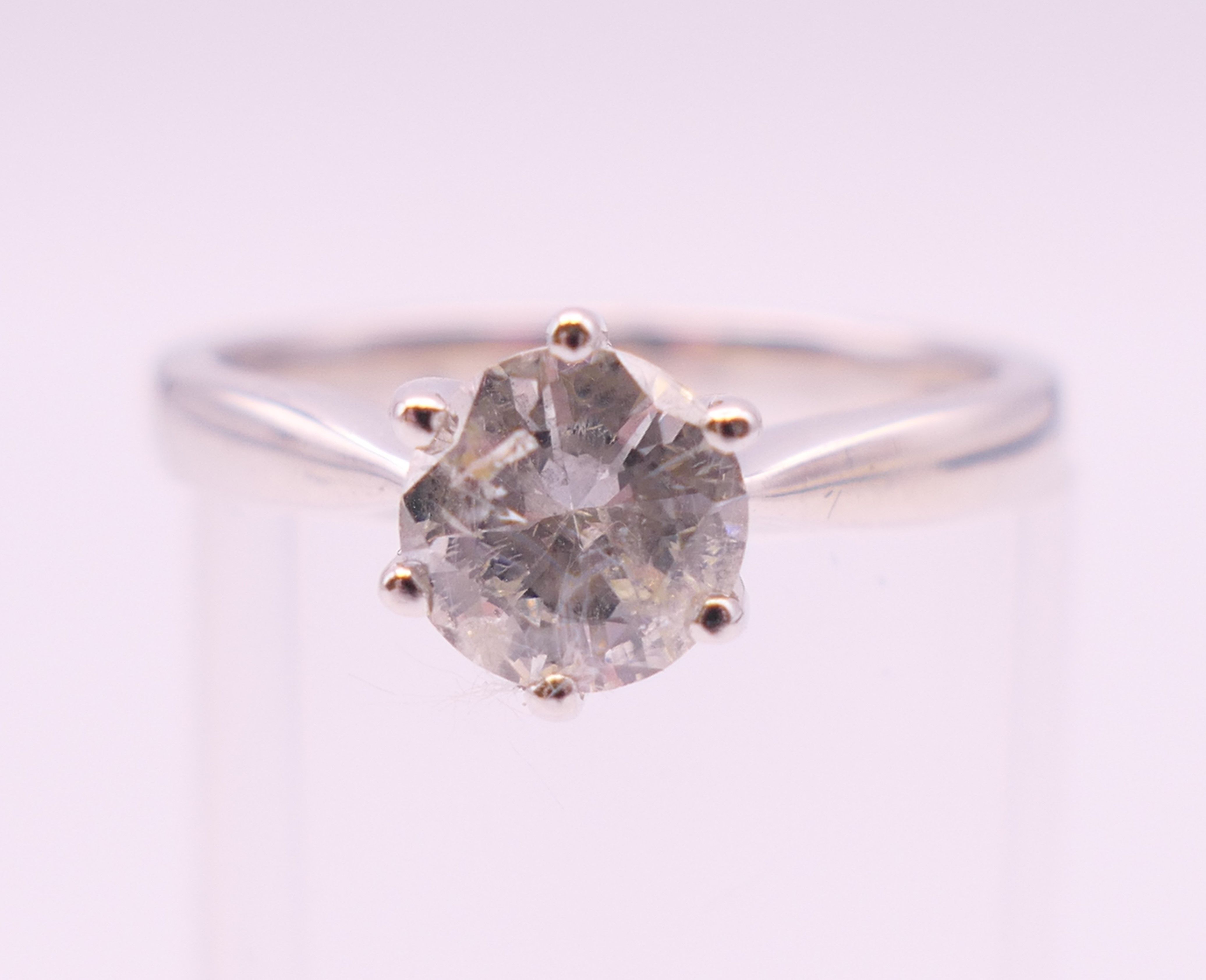 An 18 ct white gold diamond solitaire ring, the stone approximately 0.8 carat. Ring size M. - Image 2 of 6