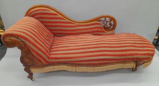 A Victorian upholstered mahogany chaise lounge. Approximately 190 cm long.