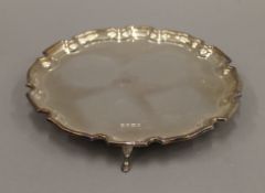 A boxed silver salver. 20.5 cm diameter. 327.6 grammes.