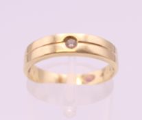 A 14 ct gold and diamond ring. Ring size O/P.