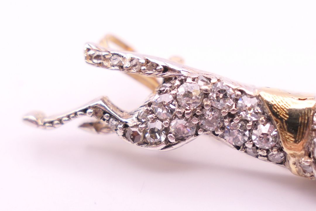 A diamond set unmarked gold racehorse brooch, possibly the horse ''Warmspun''. 3.5 cm long. 4. - Image 4 of 7