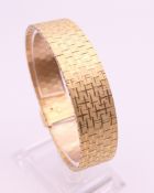 A 9 ct gold bracelet. 18.5 cm long. 42.5 grammes.