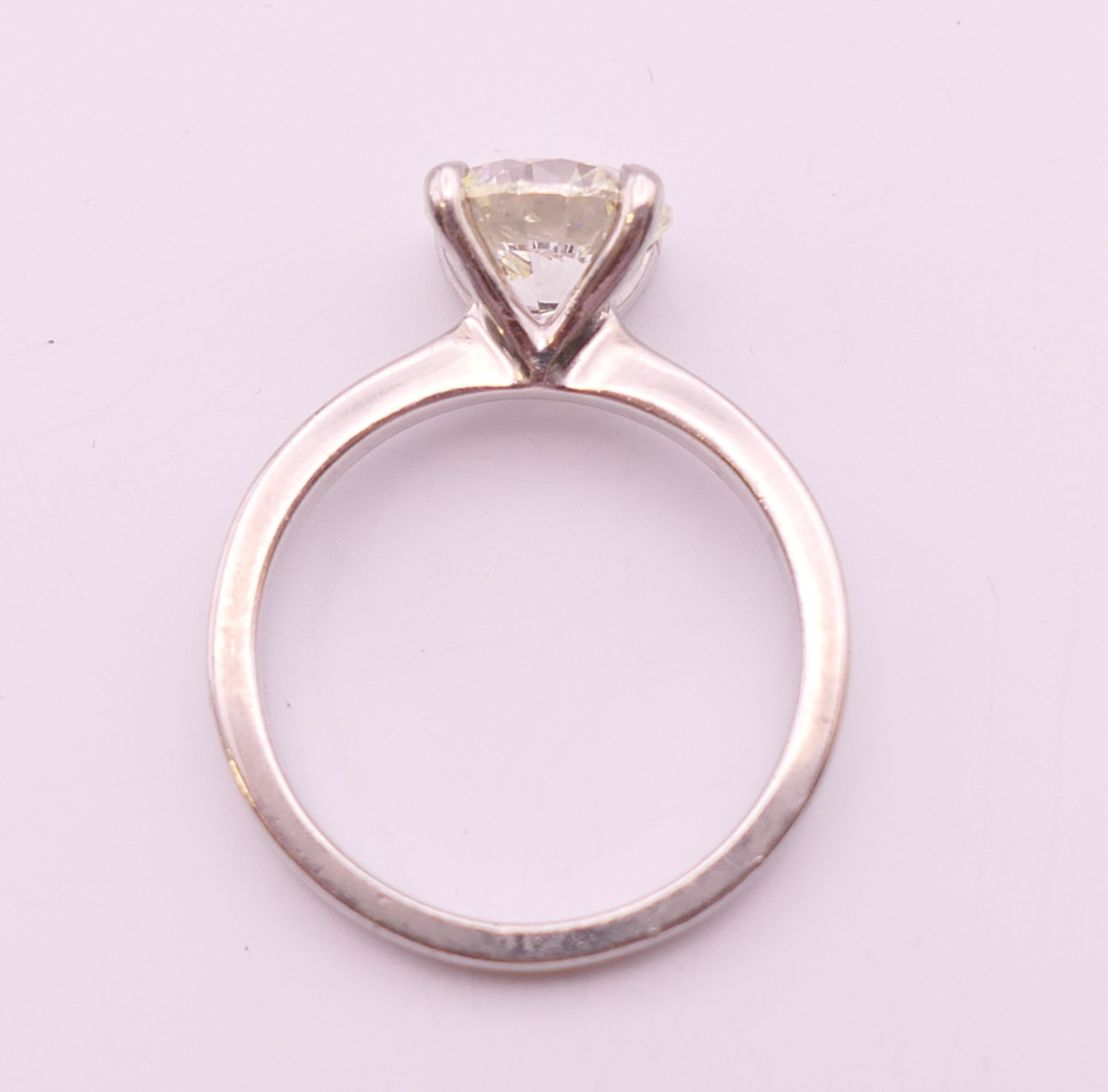 A platinum diamond solitaire ring, the stone approximately 1.9 carats. Ring size L. - Image 4 of 7