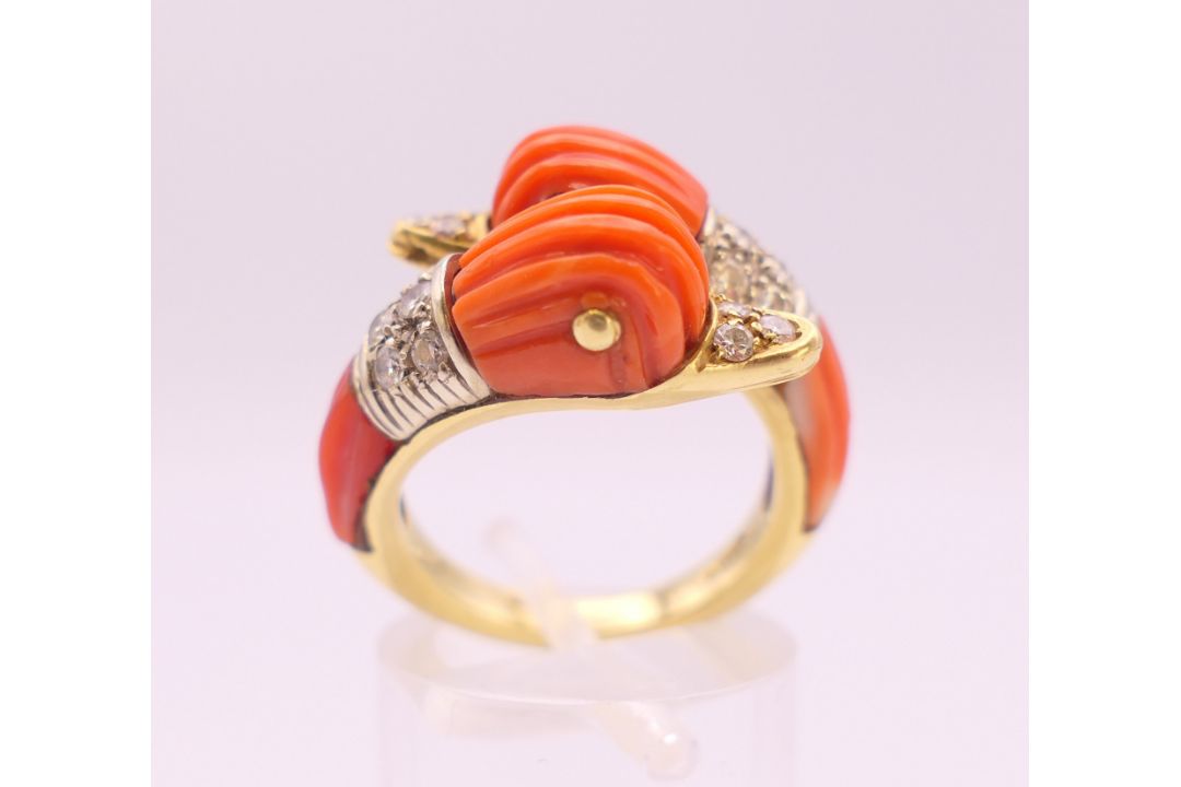 An 18 K gold coral and diamond double dolphin/duck head ring. Ring size M/N. - Image 1 of 9