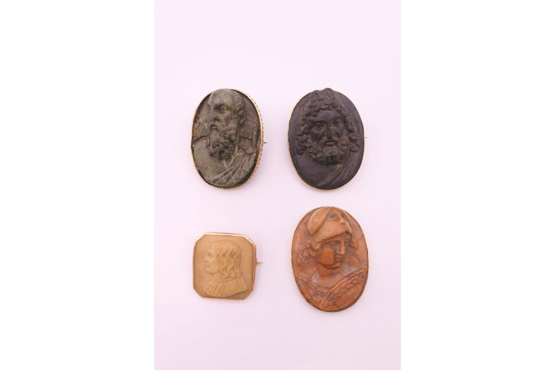 Four antique gold mounted carved stone classical portrait brooches. Three 3.5 cm high, the other 2. - Image 2 of 14