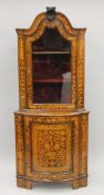 A late 18th/early 19th century Dutch marquetry corner cabinet. Approximately 197 cm wide.