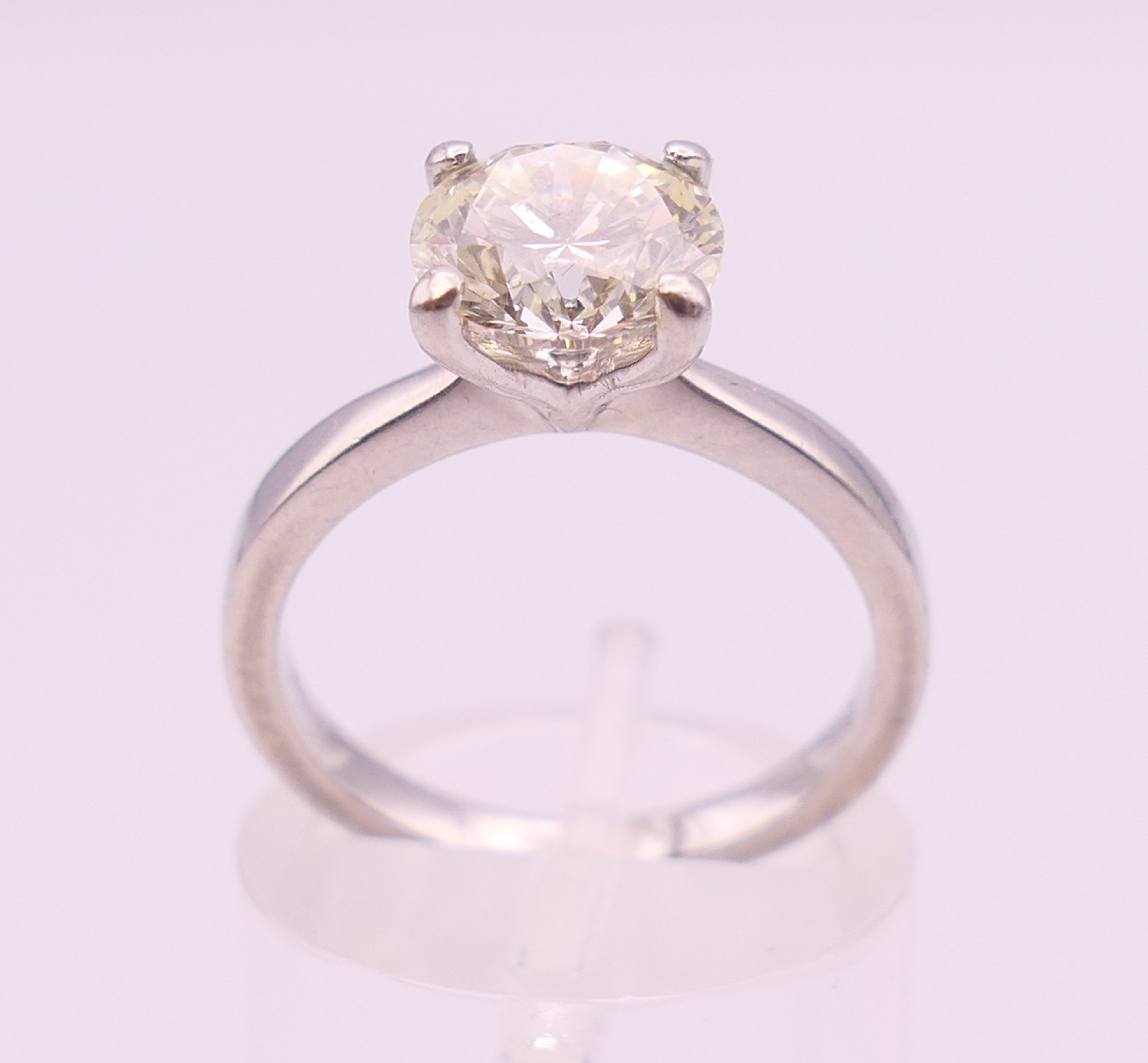 A platinum diamond solitaire ring, the stone approximately 1.9 carats. Ring size L. - Image 3 of 7