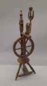 A spinning wheel. 105 cm high.