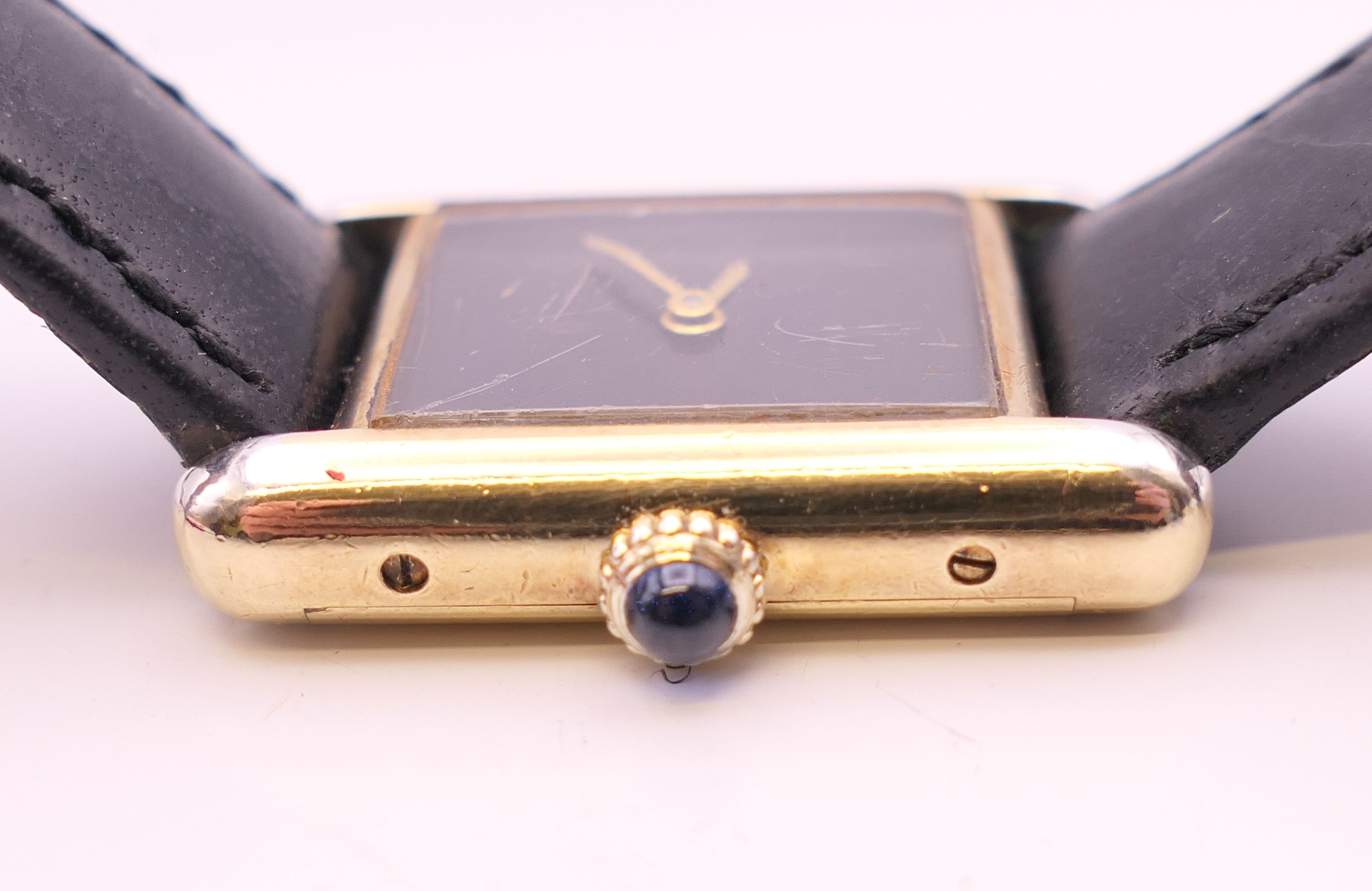 A Cartier ladies silver gilt wristwatch. 2.25 cm wide. - Image 5 of 9
