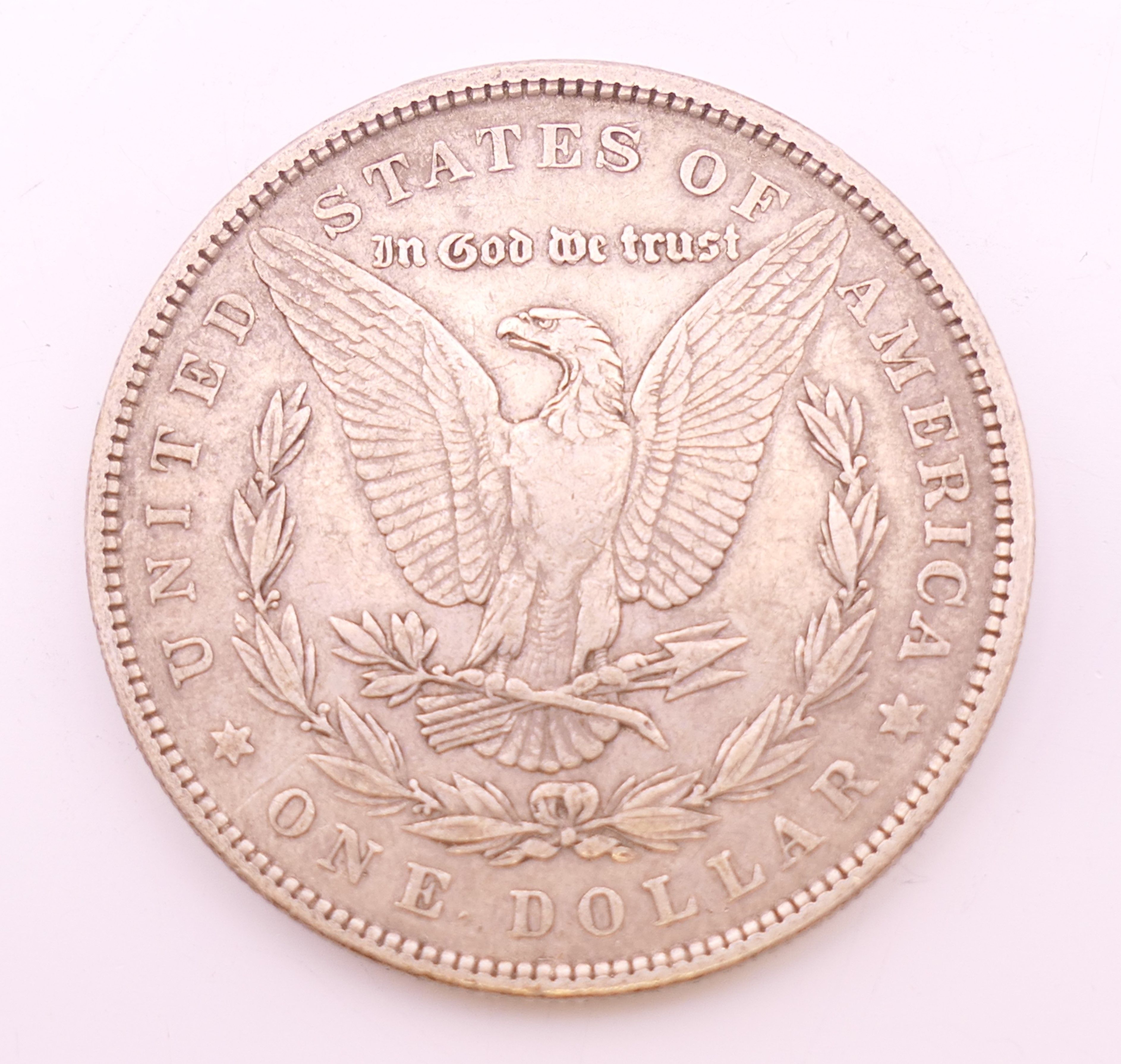 An 1883 Morgan silver dollar coin. - Image 2 of 2