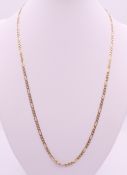 A 9 ct gold figaro chain. 52 cm long. 6.3 grammes.
