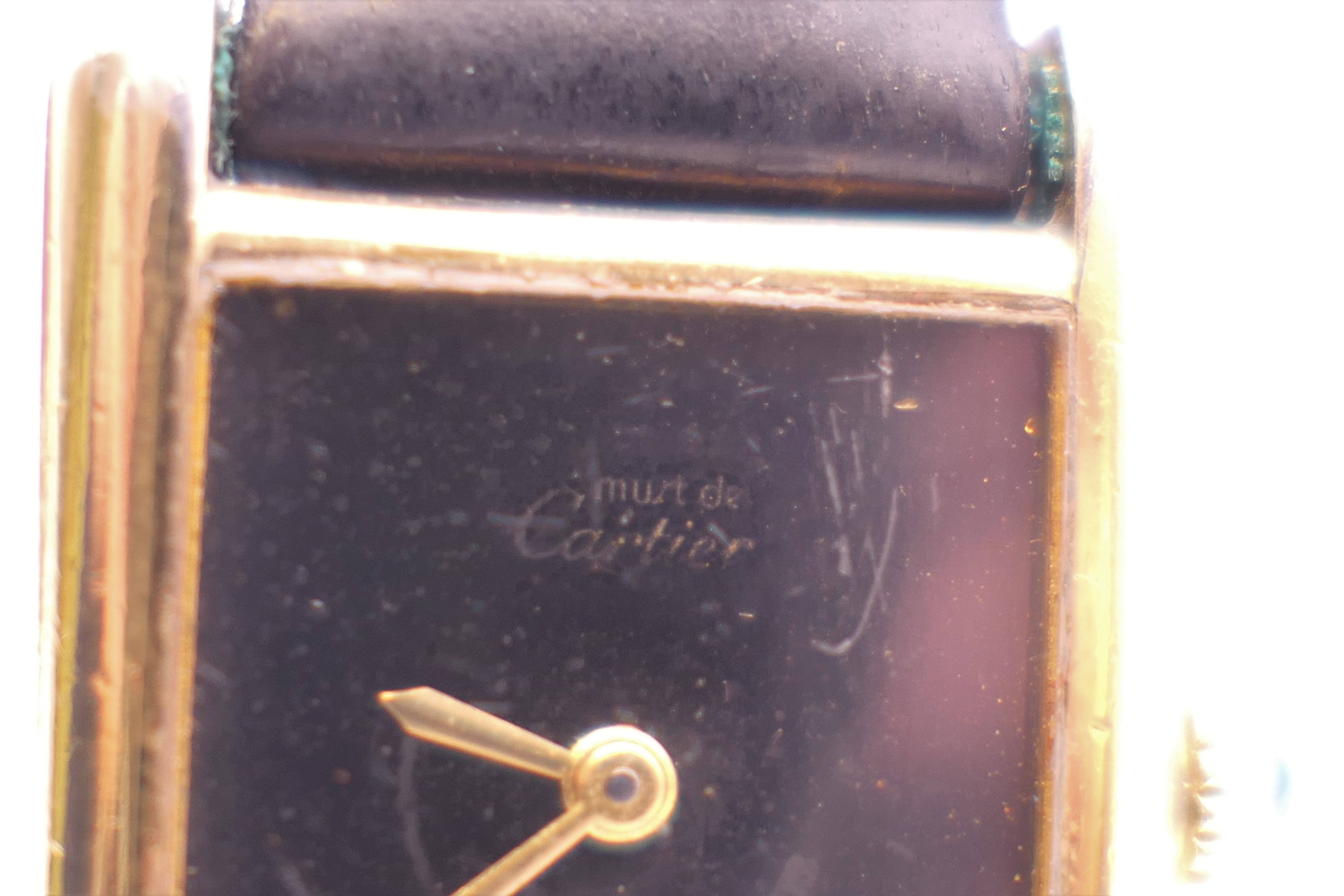 A Cartier ladies silver gilt wristwatch. 2.25 cm wide. - Image 3 of 9