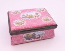 An 18th century pink ground Battersea enamel snuff box of rectangular form,