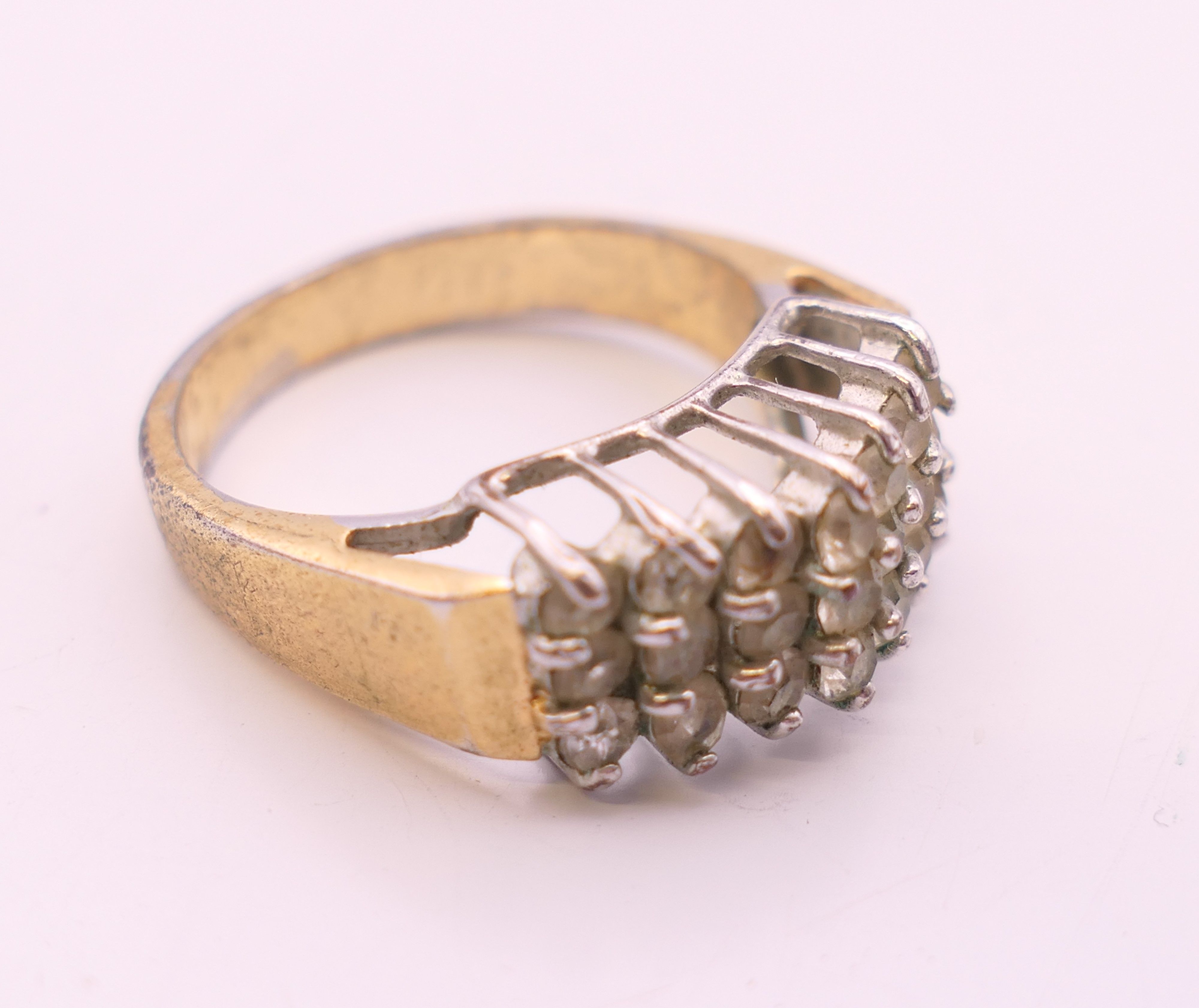 A silver and cubic zirconia ring, another ring and a chain. Chain 47 cm long. - Image 5 of 7