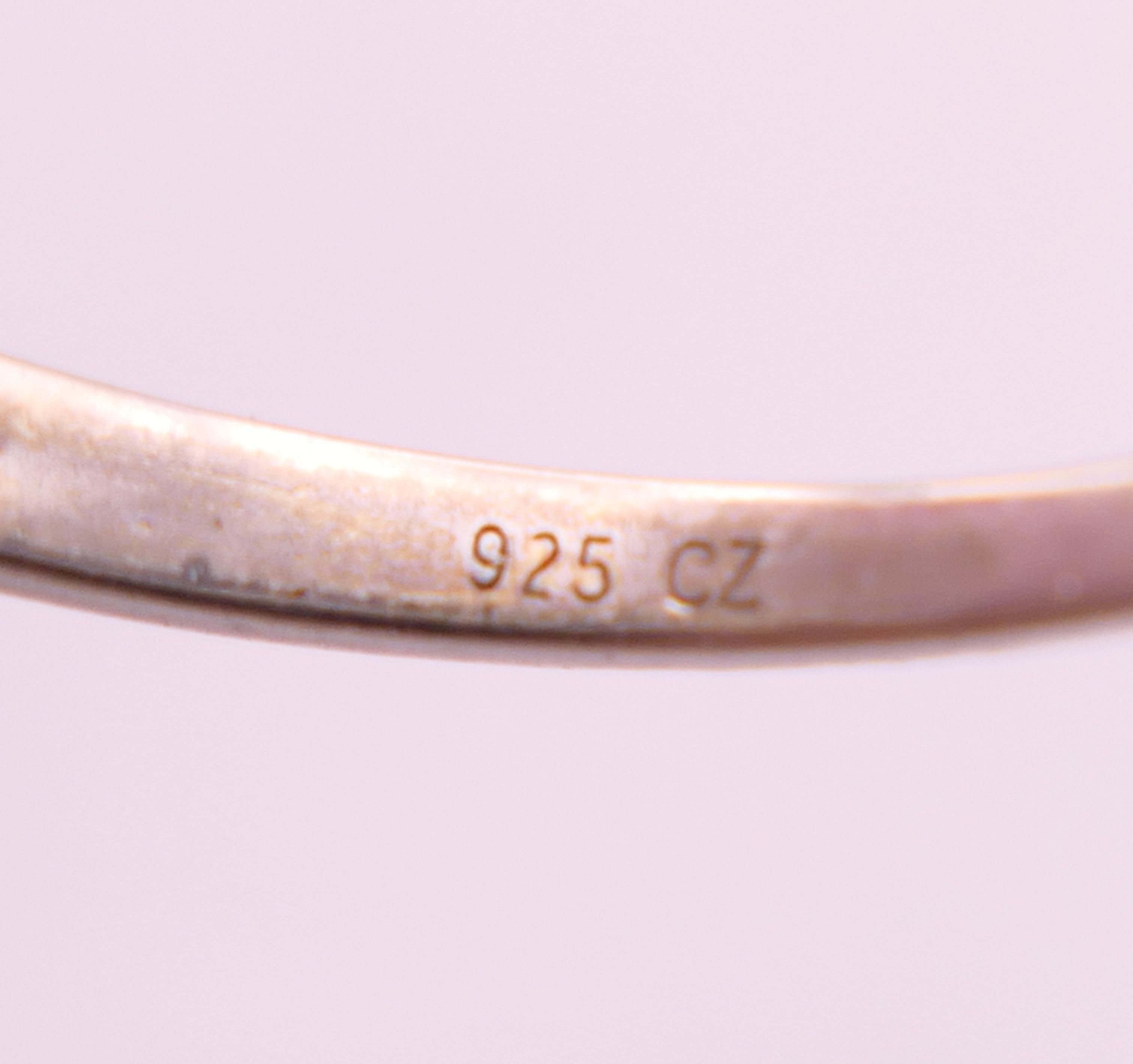 A silver and cubic zirconia ring, another ring and a chain. Chain 47 cm long. - Image 7 of 7