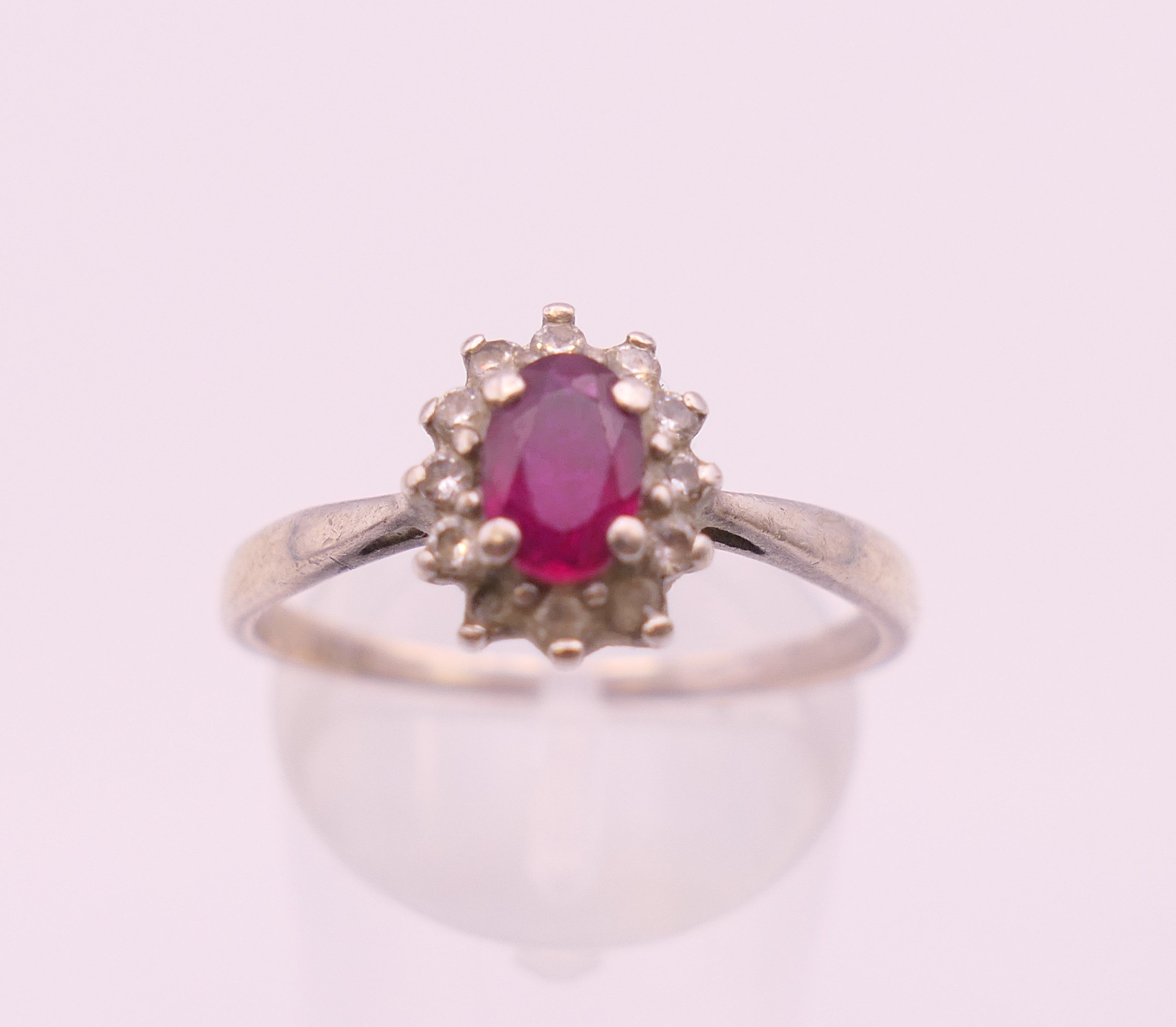 A silver and cubic zirconia ring, another ring and a chain. Chain 47 cm long. - Image 6 of 7