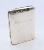 A Carrs silver 'Thank You' folding photograph frame. 5 x 4 cm closed.