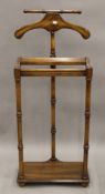 A valet stand. 43.5 cm wide.