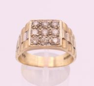 A 9 ct gold gentleman's ring. Ring size V. 7.3 grammes total weight.