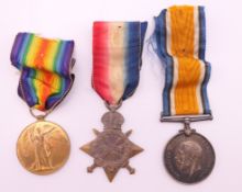 A trio of first world war medals awarded to 35116 DVR T BARRATT RA.