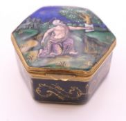 A Limoges enamel hexagonal shaped patch box. 4.5 cm wide, 2.5 cm high.