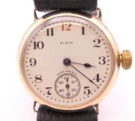 A 9 ct gold cased Elgin wristwatch. 3.5 cm wide. 30.3 grammes total weight.