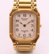 A Bulova gold plated stainless steel Super Seville quartz bracelet watch,