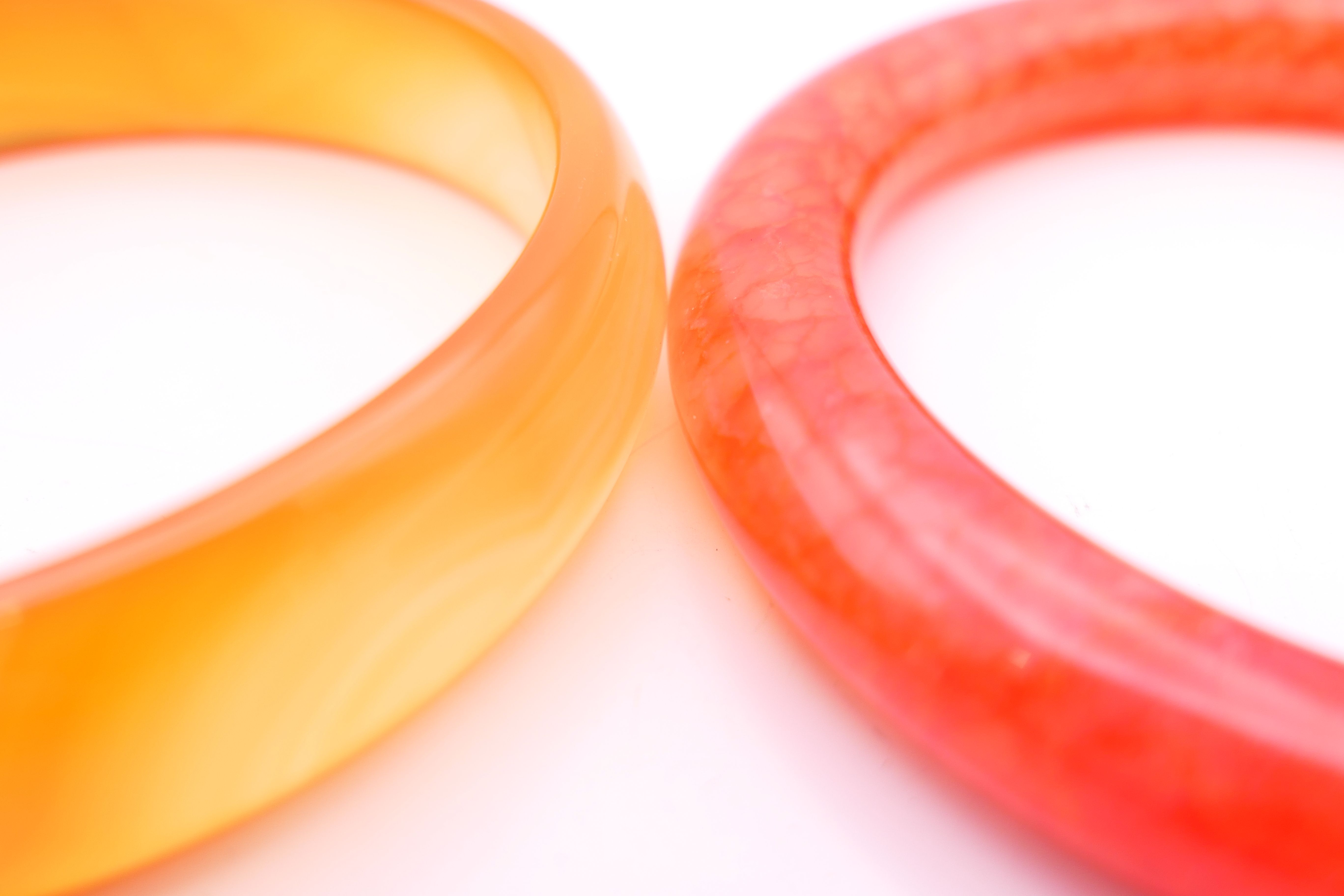 Three various bangles. Black and rust coloured bangles 6 cm internal diameter, red bangle 5. - Image 2 of 3