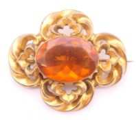 A Victorian Pinchbeck citrine set brooch. 4.5 x 4 cm.