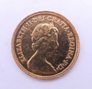 A 1982 gold half sovereign.