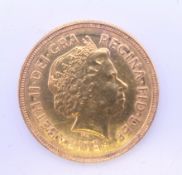 A 2000 gold sovereign.