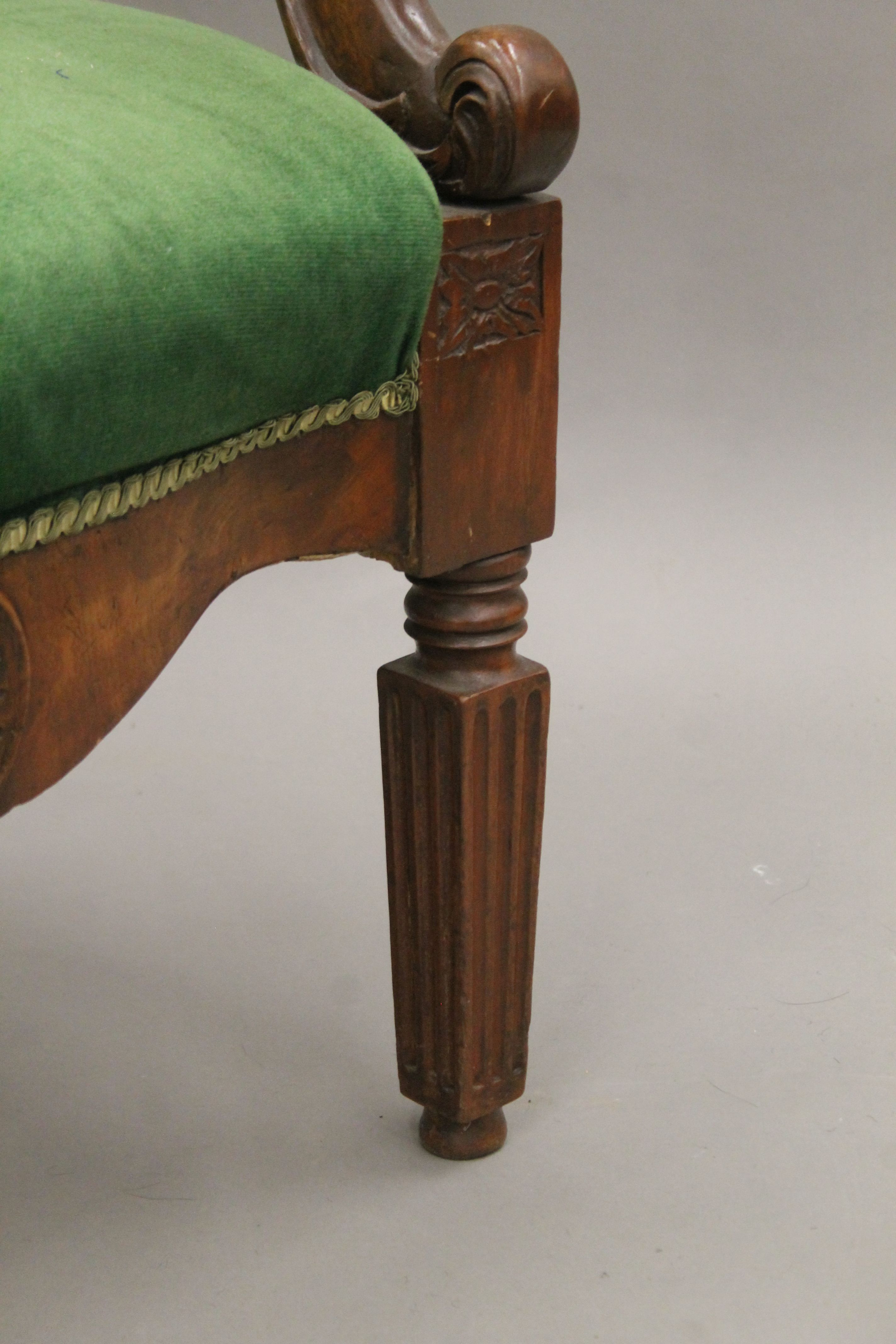 A 19th century mahogany carved open armchair. 59 cm wide. - Image 5 of 5