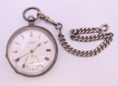 A silver cased open face pocket watch. 5 cm diameter.