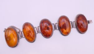A silver dress bracelet.