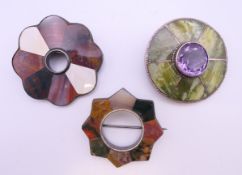 Three Scottish agate brooches. Two 5 cm diameter, the other 4.5 cm diameter.