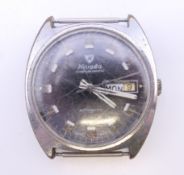 A gentlemen's Nivada Compensamatic Automatic wristwatch, lacking strap. 3.5 cm wide.