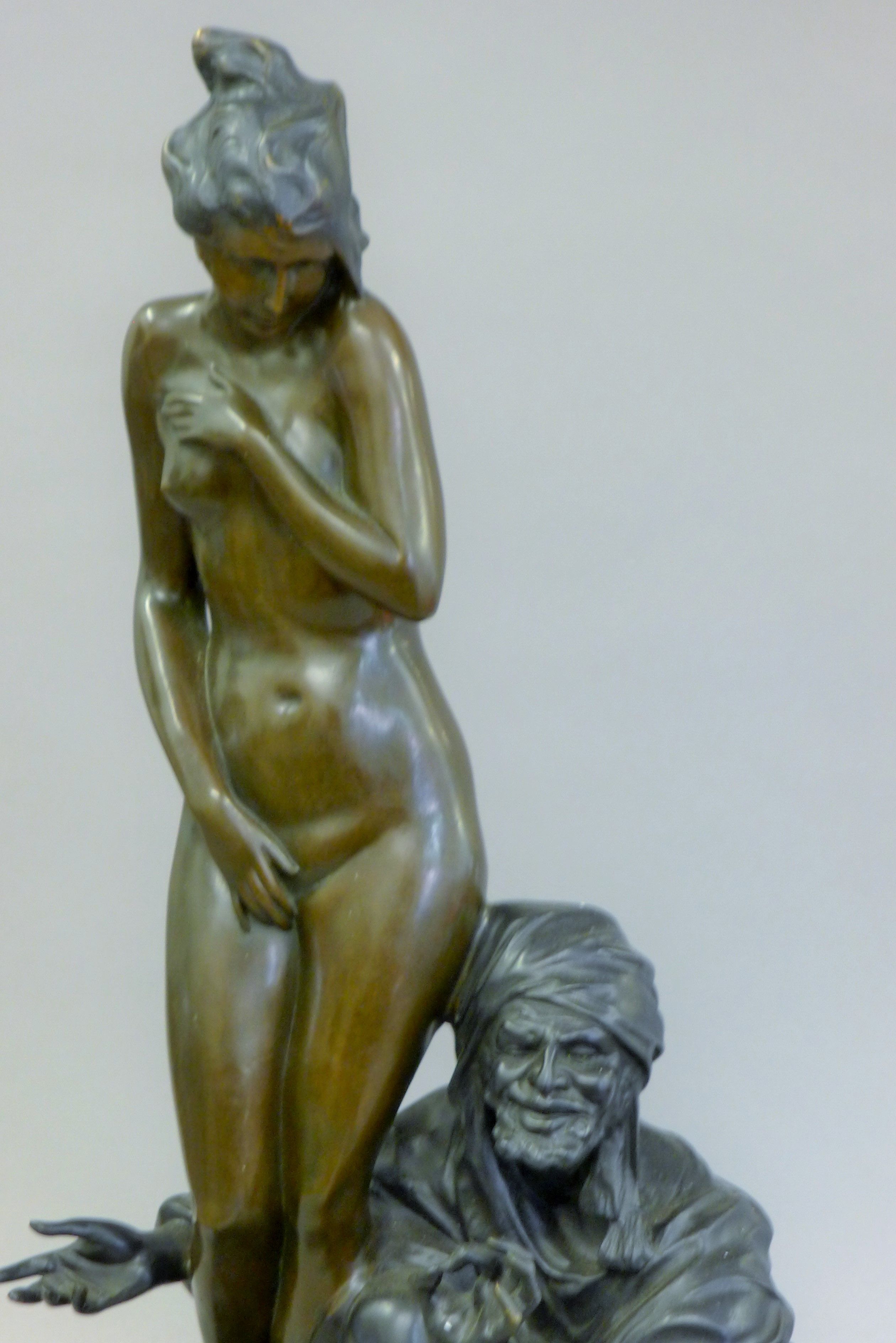 A bronze model of an Arab and a nude woman. 69 cm high. - Image 5 of 6