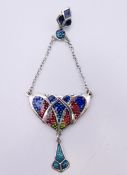 A silver Art Nouveau style pendant. 7 cm high overall.