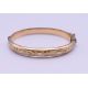 A 1/5th 9 ct rolled gold bangle form bracelet. 6.5 cm wide. 11 grammes total weight. - Image 1 of 8