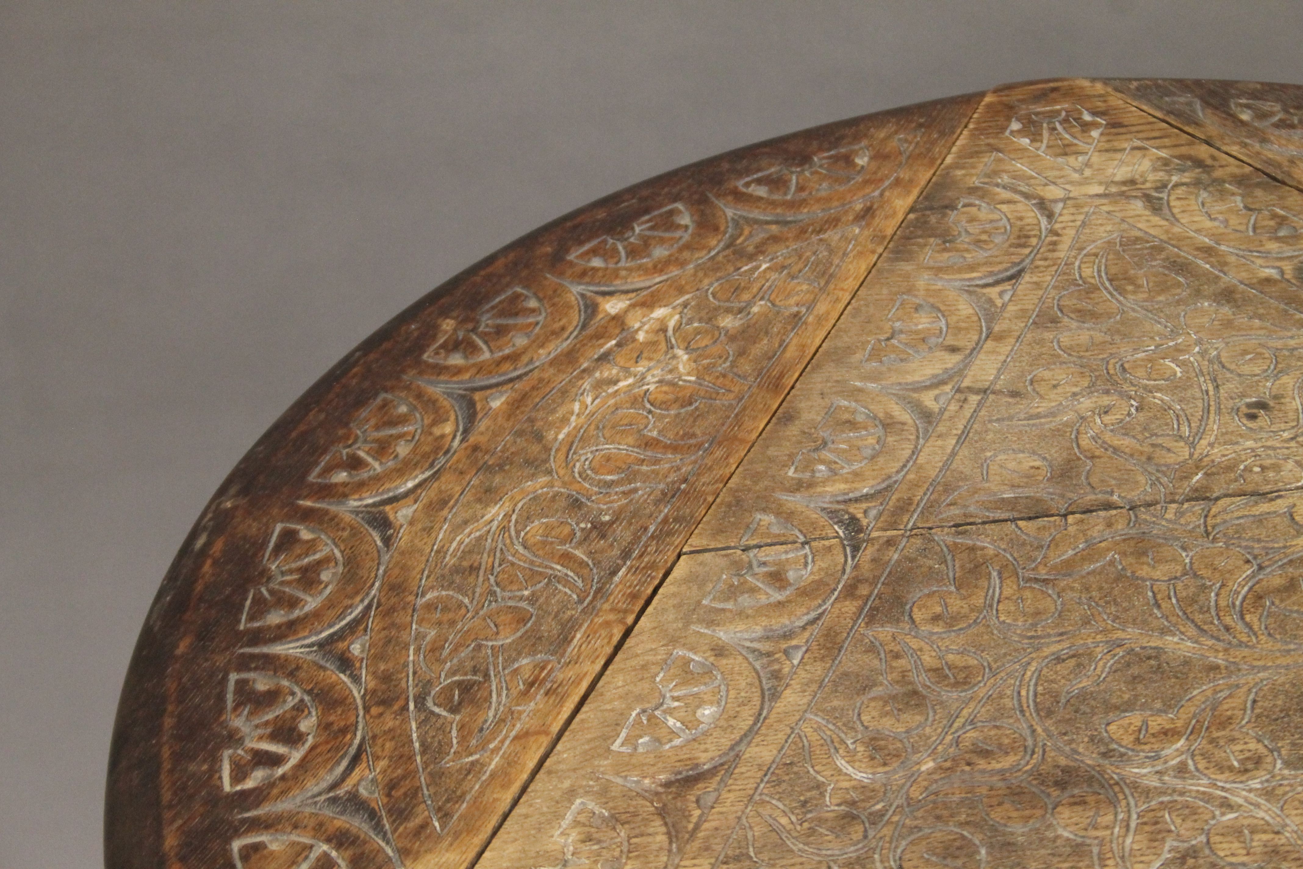 A Victorian carved oak triple drop leaf table. 59 cm wide. - Image 3 of 6