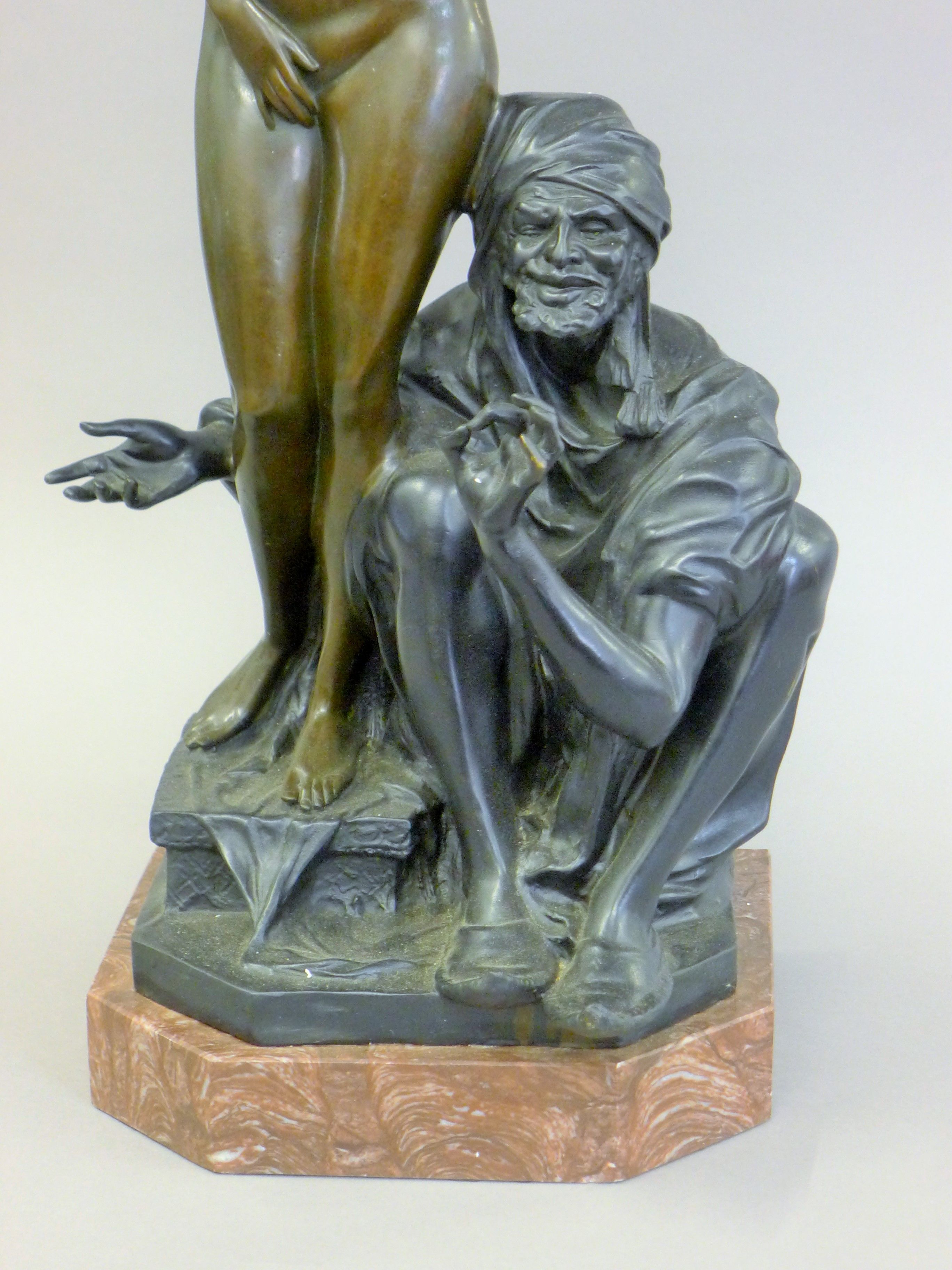 A bronze model of an Arab and a nude woman. 69 cm high. - Image 4 of 6