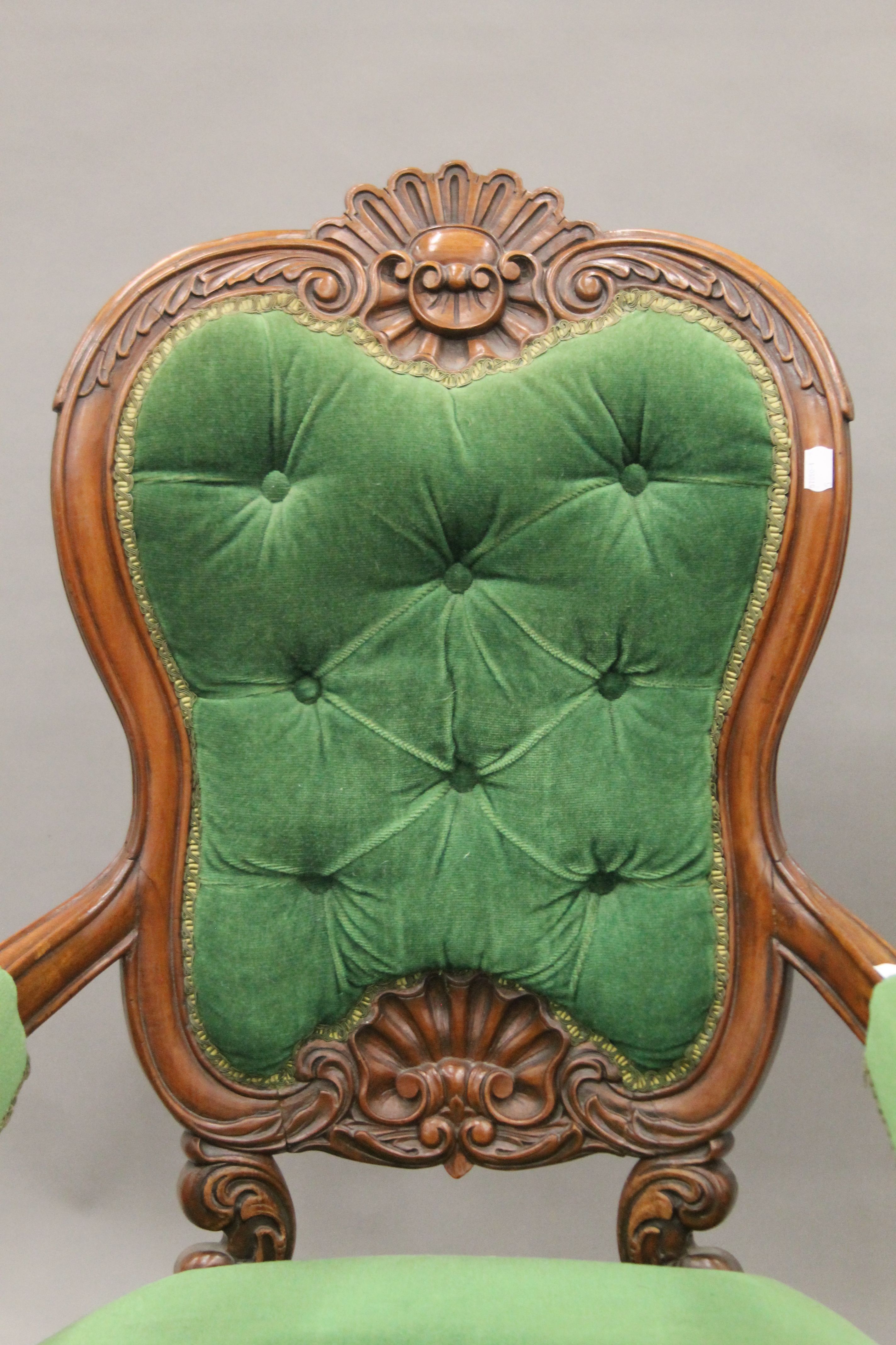A 19th century mahogany carved open armchair. 59 cm wide. - Image 2 of 5