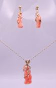 A coral pendant and matching earrings, set in 9 ct gold with a 9 ct gold chain. Pendant 4.