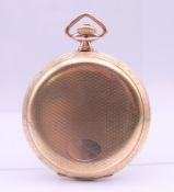 A gold plated full hunter pocket watch. 5 cm diameter.
