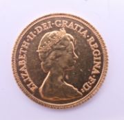 A 1982 gold half sovereign.