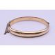 A 1/5th 9 ct rolled gold bangle form bracelet. 6.5 cm wide. 11 grammes total weight. - Image 4 of 8