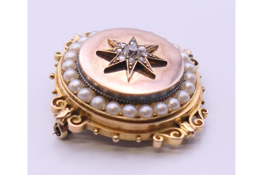 A Victorian unmarked gold seed pearl and diamond set pendant/brooch. 3.5 cm diameter. 13. - Image 2 of 6