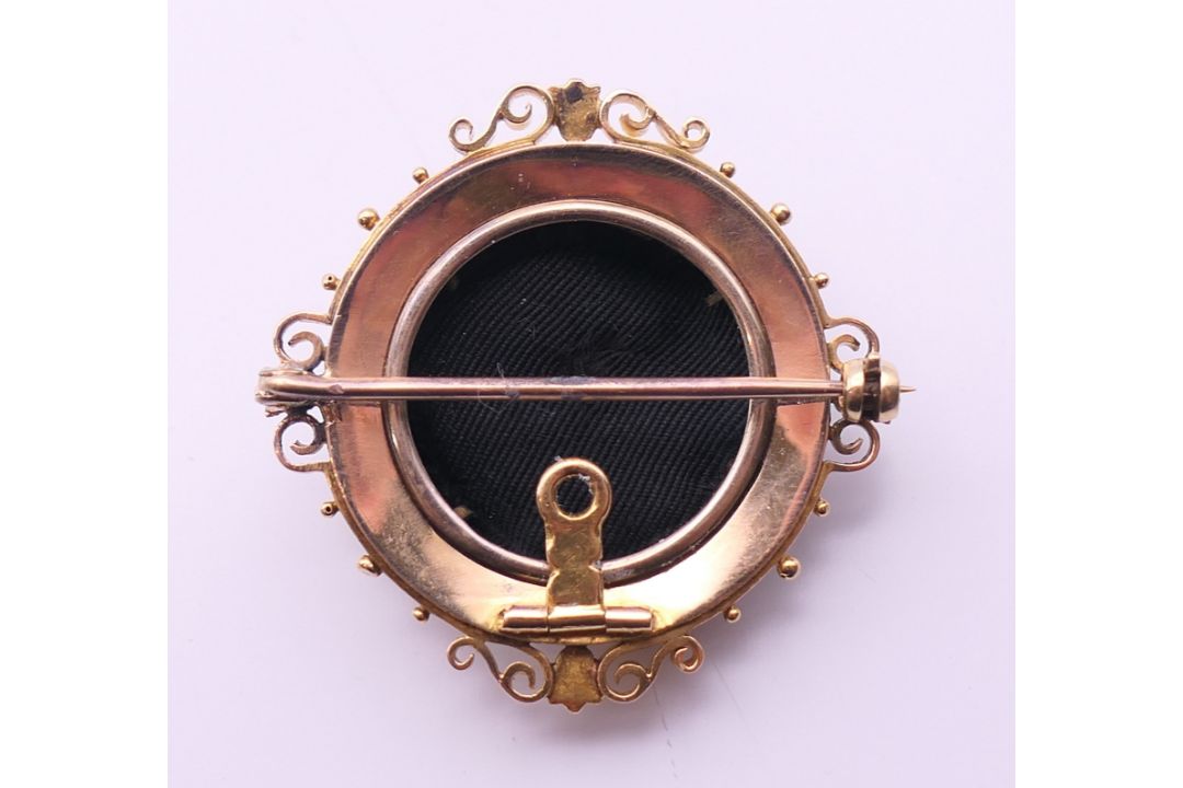 A Victorian unmarked gold seed pearl and diamond set pendant/brooch. 3.5 cm diameter. 13. - Image 3 of 6